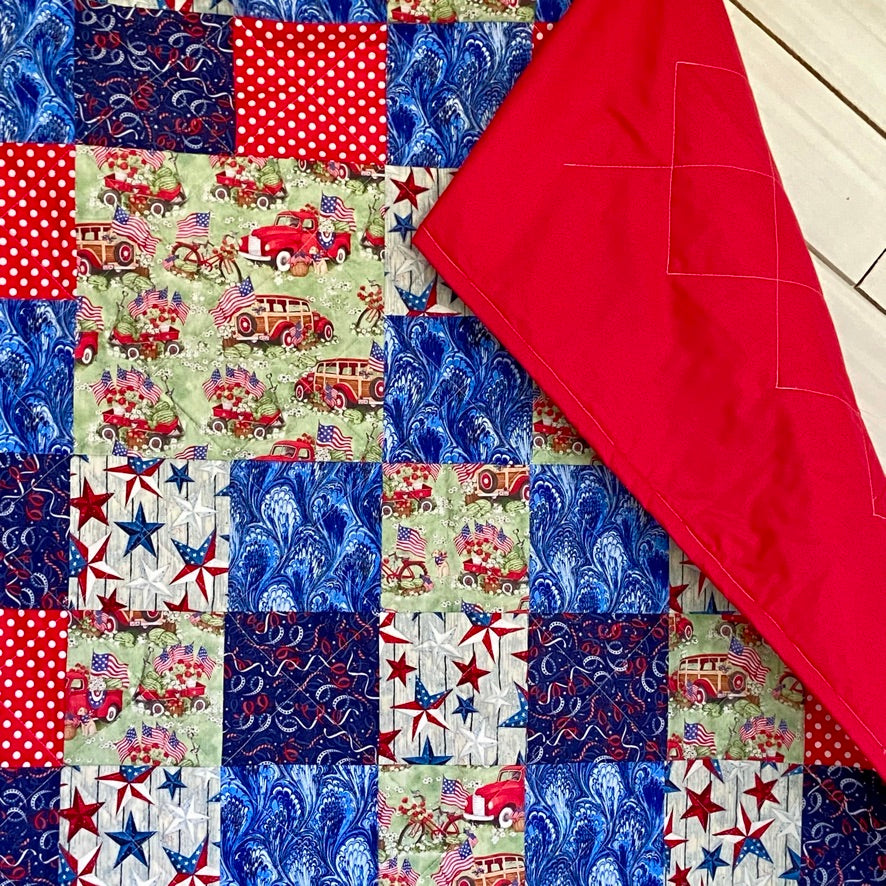 Patchwork Quilt for Patriotic Decor Featuring Iconic Red Truck