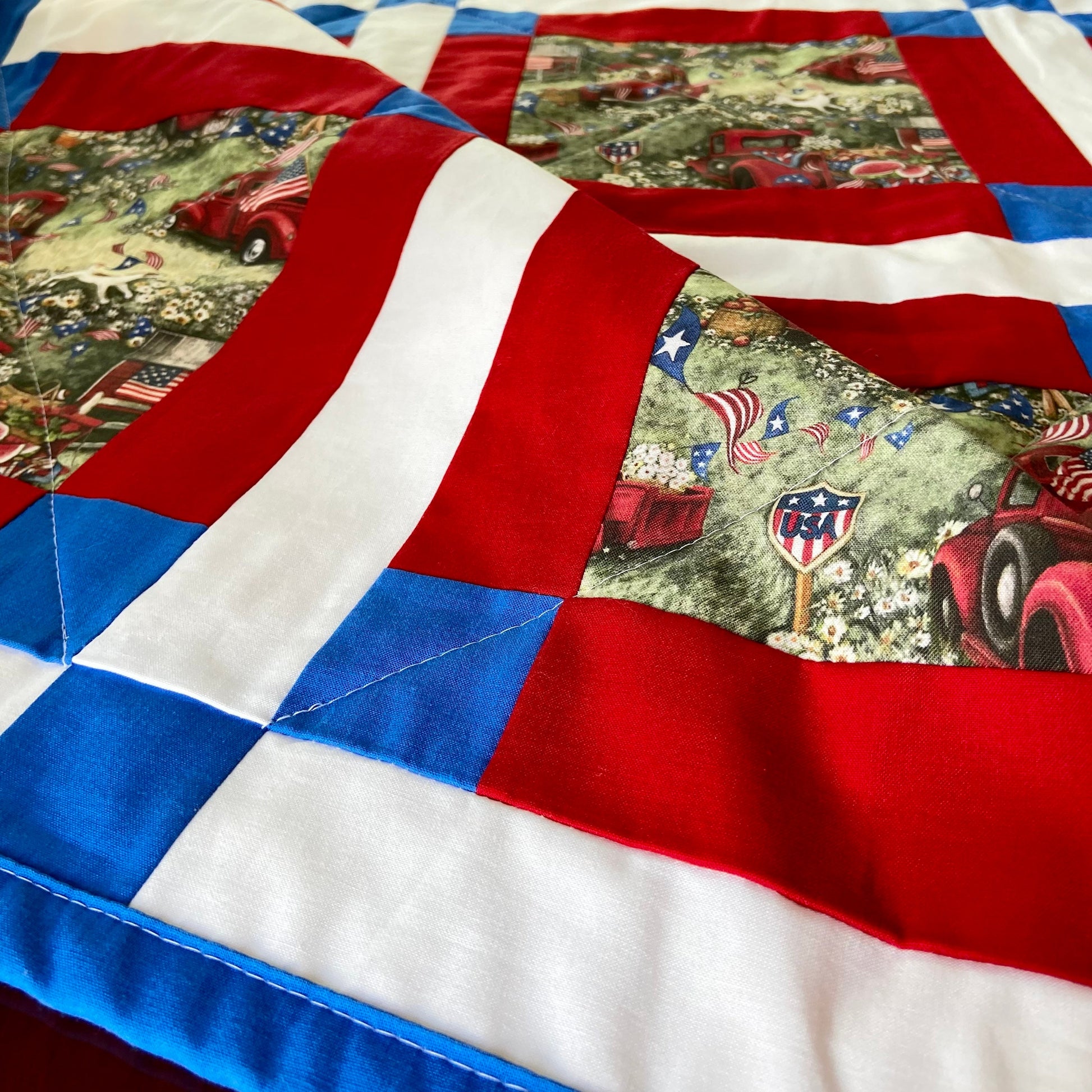 Homemade Modern Patchwork Quilt with Patriotic Theme Perfect for Fourth of July. Quilted Picnic Blankets, Woven Throw Blanket, American Flag