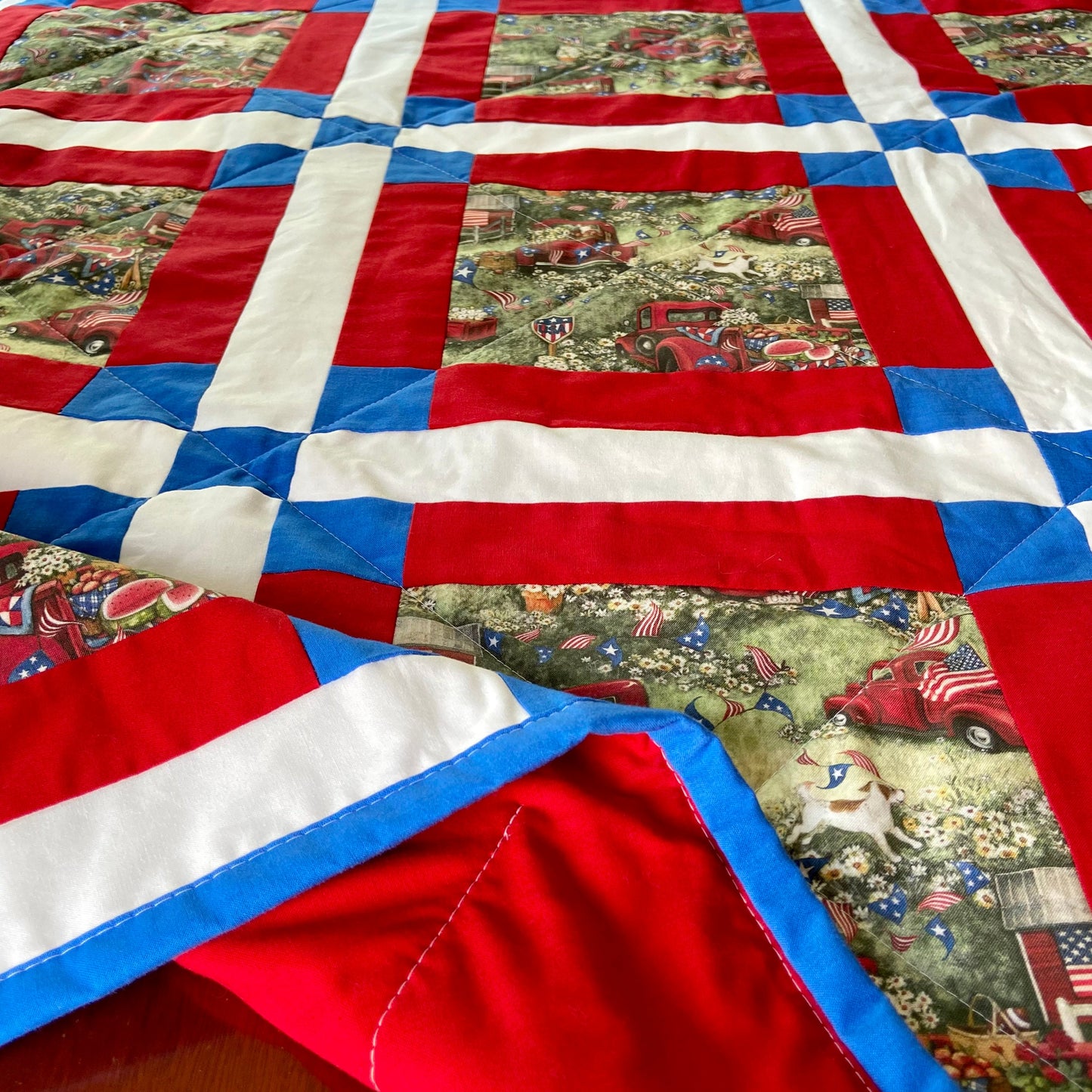 Homemade Modern Patchwork Quilt with Patriotic Theme Perfect for Fourth of July. Quilted Picnic Blankets, Woven Throw Blanket, American Flag